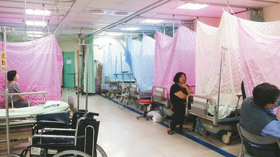 台南市登革热病患塞爆医院产妇睡走廊（图）